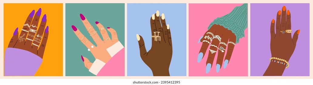 Multiracial women hands with gold, silver jewelry.