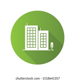 Multi-storey building green flat design long shadow glyph icon. Apartment houses. Multistorey housing, modern condo. City accommodation, hotel, business center exterior. Vector silhouette illustration