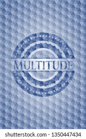 Multitude blue hexagon badge.