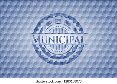 Municipal blue emblem with geometric pattern.