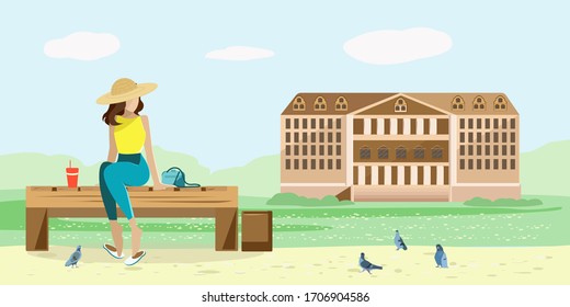 A Museum building standing in a Park and a girl sitting on a bench and looking at pigeons