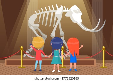 Museum for kids vector, back to school concept. Children looking at skeleton of mastodon, mammoth with tusks, exponent standing on wooden podium with light. Flat cartoon boy and girls at exhibition