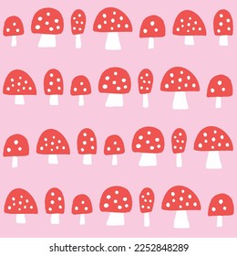 Mushroom background pattern . Vector seamless repeat of red spotted hand drawn textured mushrooms. Cute nature illustration, design element. 