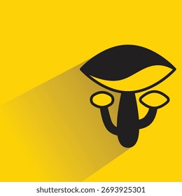 mushroom with shadow on yellow background