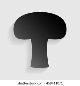 Mushroom simple sign. Black paper with shadow on gray background.
