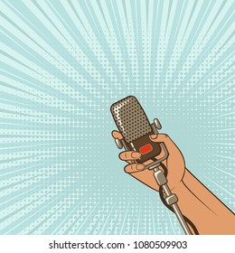 music background. male hand with retro microphone. vector illustration - eps 8