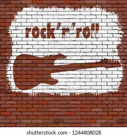 Music background rock and roll stencil on a brick wall.