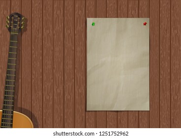 Music background with wooden planks, acoustic guitar and a piece of paper for an inscription or image.