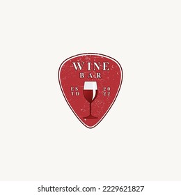 Music bar vintage logo design combination pick and wine glass