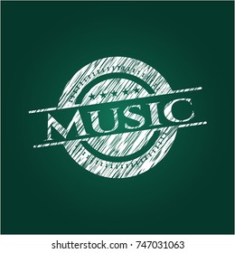 Music chalk emblem written on a blackboard
