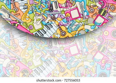 Music concept. Musical instruments and objects. Background design with free text space. Hand drawn doodle style. Print ready template for advertisement, flyer, banner, brochure. Vector illustration.