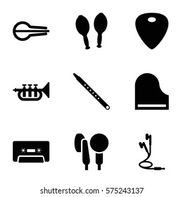 Music icon. Set of 9 Music filled icons such as musical instrument, cassette, guitar mediator, piano, musical pipe, maracas, earphones, microphone