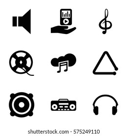 Music icon. Set of 9 Music filled icons such as treble clef, megaphone, speaker, film tape, record player, triangle musical instrument, mp3 player on hand, music cloud