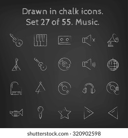 Music icon set hand drawn in chalk on a blackboard vector white icons on a black background.