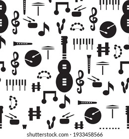 Music instruments and notes in a black and white vector illustration. Seamless pattern. Guitar, piano, drum, cymbals, maracas, flute,  and tambourine.