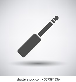 Music jack plug-in icon on gray background with round shadow. Vector illustration.