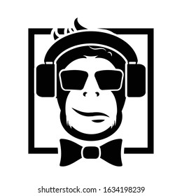 music logo. Monkey in headphones and a bow-tie. black and white vector image.