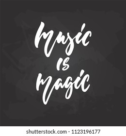 Music is magic - hand drawn Musical lettering phrase isolated on the black chalkboard background. Fun brush chalk vector quote for banners, poster design, photo overlays.