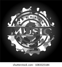 Music on grey camo texture