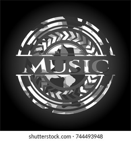 Music on grey camouflaged texture