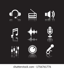 Music and sound icons. White icons with reflection.