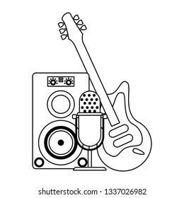 music speaker with microphone and electric guitar in black and white