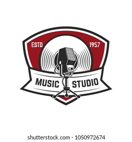 Music studio. Emblem template with retro microphone. Design element for logo, label, emblem, sign. Vector illustration