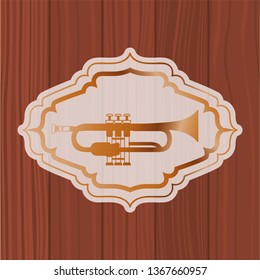 music trumpet in frame with wooden background
