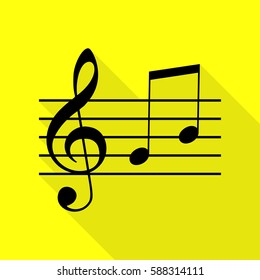 Music violin clef sign. G-clef and notes G, H. Black icon with flat style shadow path on yellow background.