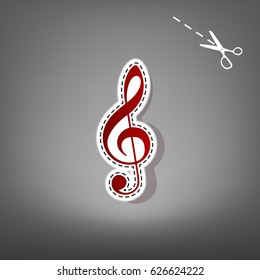 Music violin clef sign. G-clef. Treble clef. Vector. Red icon with for applique from paper with shadow on gray background with scissors.