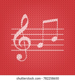 Music violin clef sign. G-clef and notes G, H. Vector. Knitted white icon on a red knitted background.