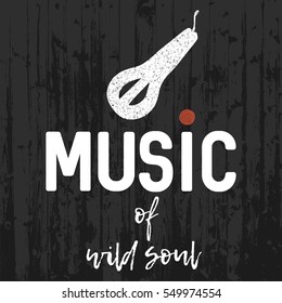Music of wild soul art text with folk pagan harp on wooden background.