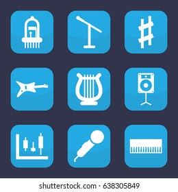 Musical icon. set of 9 filled musical icons such as harp, loudspeaker, microphone, piano, guitar
