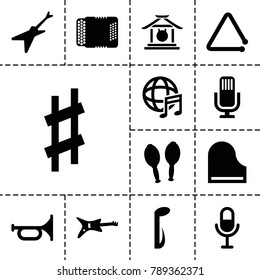 Musical icons. set of 13 editable filled musical icons such as trumpet, guitar, microphone, music note, piano, harmonic, maracas, international music