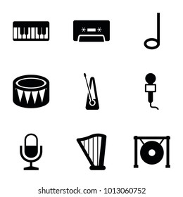 Musical icons. set of 9 editable filled musical icons such as microphone, cassette, harp, drum, gong, piano, music note