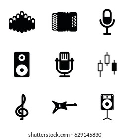 Musical icons set. set of 9 musical filled icons such as microphone, harmonic, harmonica, loudspeaker, guitar, treble clef