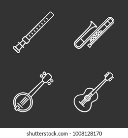 Musical instruments chalk icons set. Duduk, guitar, banjo, trombone. Isolated vector chalkboard illustrations
