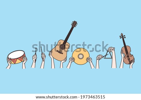 Musical instruments and creative arts concept. Human hands holding musical instruments guitar violin drums teangle over blue background vector illustration 