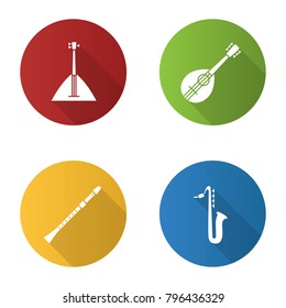 Musical instruments flat design long shadow glyph icons set. Balalaika, mandolin, saxophone, flute. Vector silhouette illustration