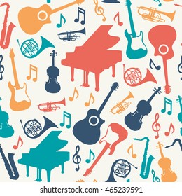 Musical instruments silhouette icons background seamless pattern