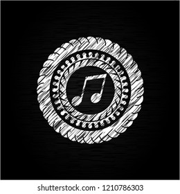 musical note icon drawn on blackboard