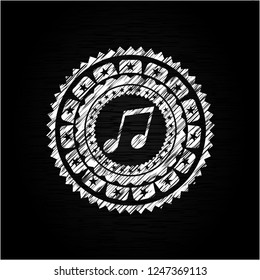 musical note icon drawn on a blackboard
