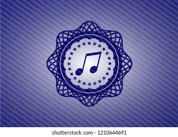 musical note icon inside badge with jean texture