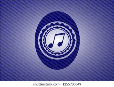 musical note icon inside badge with jean texture