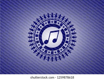 musical note icon inside badge with jean texture