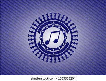 musical note icon inside badge with denim texture
