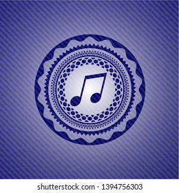 musical note icon inside badge with jean texture