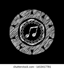 musical note icon inside chalk emblem written on a blackboard