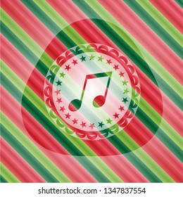 musical note icon inside christmas colors style emblem.