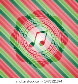 musical note icon inside christmas colors style emblem.